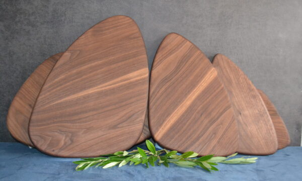 Pebble shaped chopping boards for perfect handmade wooden gifts by The Wooden Gem.