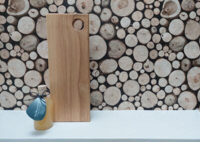 This is a solid handmade ash chopping board by The Wooden Gem.