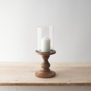 Glass pillar candle holders at The Wooden Gem.