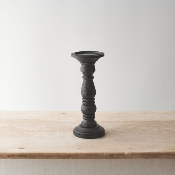 Large black wood pillar candle holders at The Wooden Gem