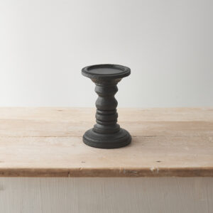 Small black wooden pillar candle holder at The Wooden Gem.
