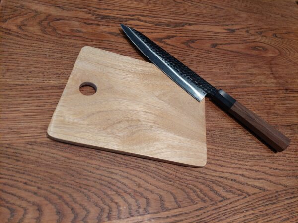 This is a mini wooden chopping board by The Wooden Gem.