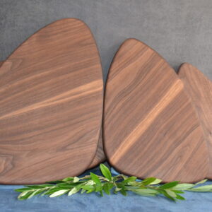 Pebble shaped chopping board. Unique handmade chopping boards from Black walnut.